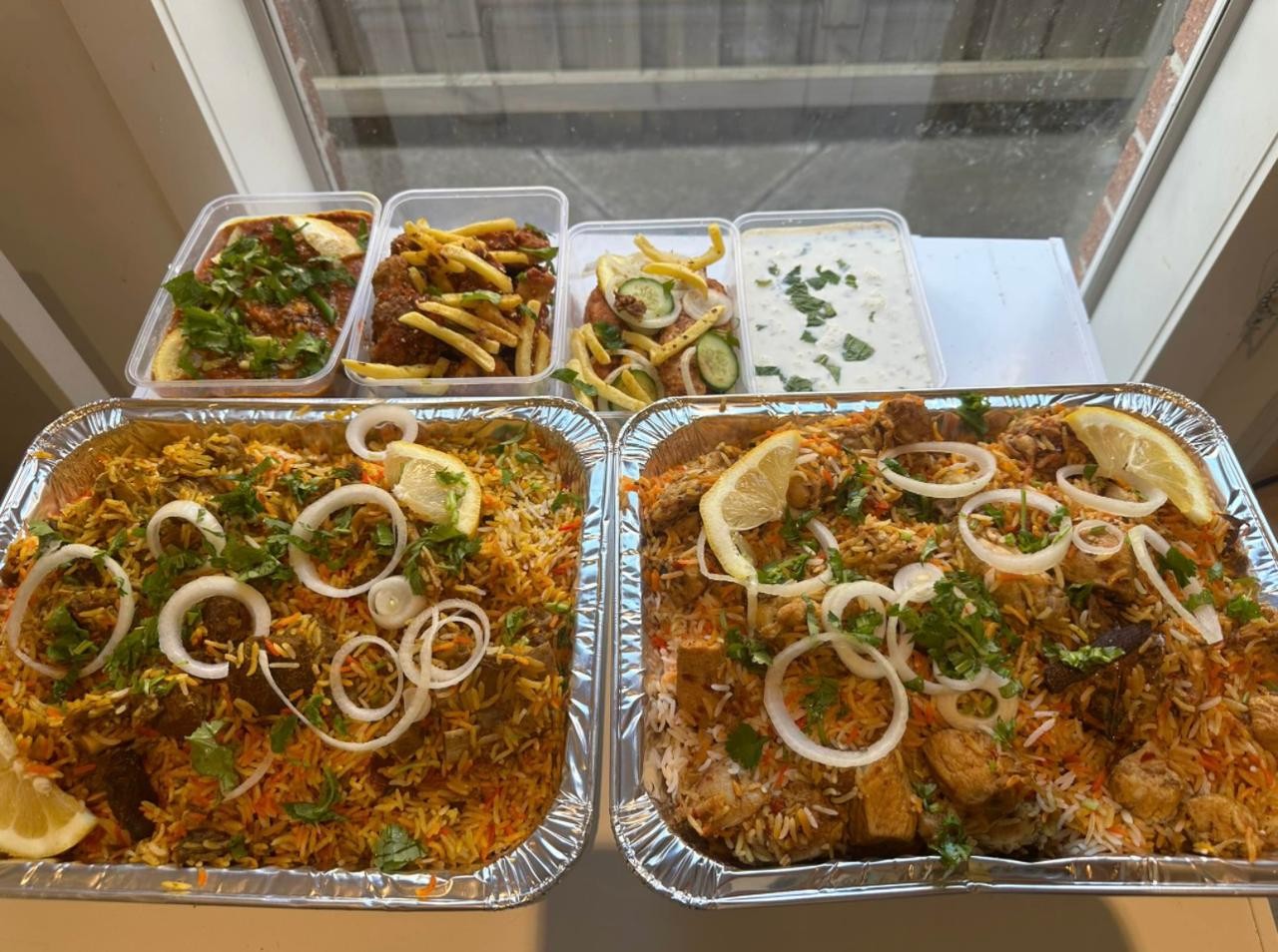 Kinza's Kitchen biryani catering trays